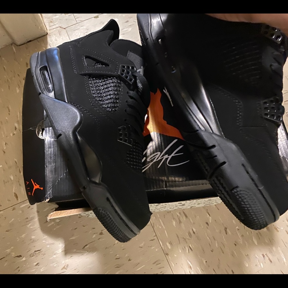 Brand new black cat 4 size 7